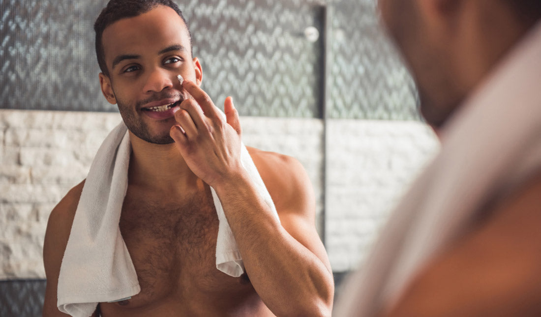 man applying cream