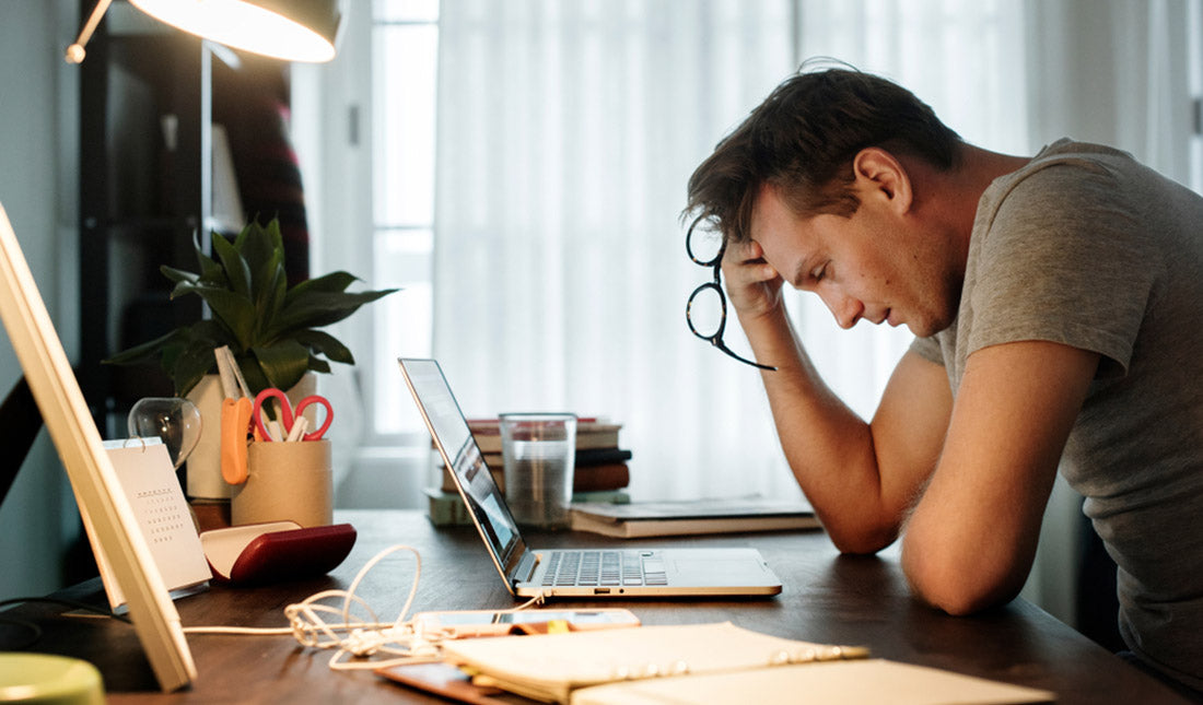 man stressed while working