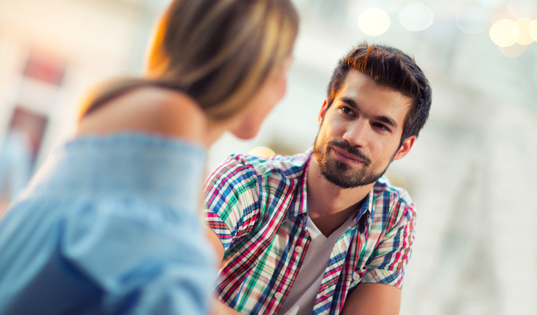 young couple sitting in cafe